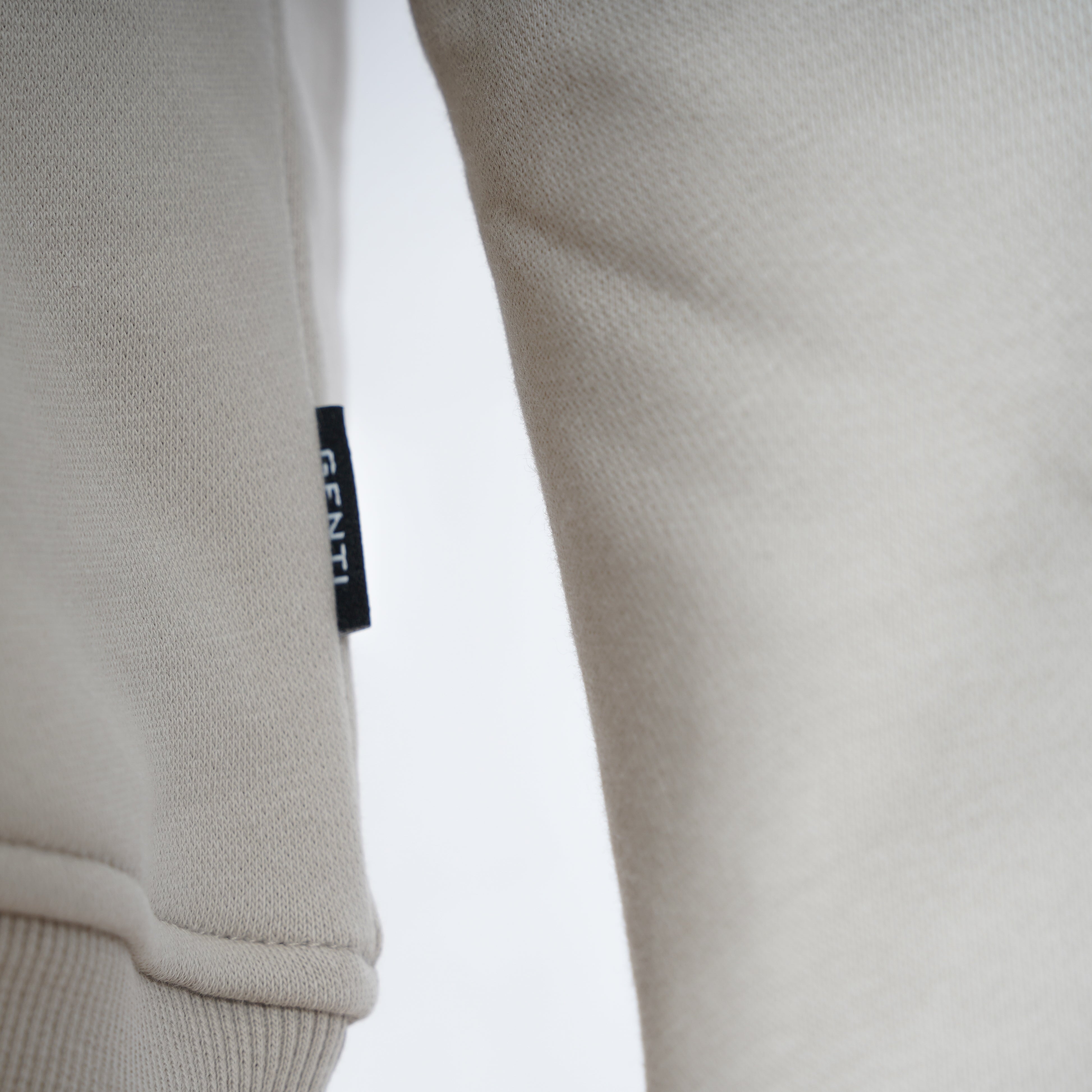 Genti Sweater Beige | Logo