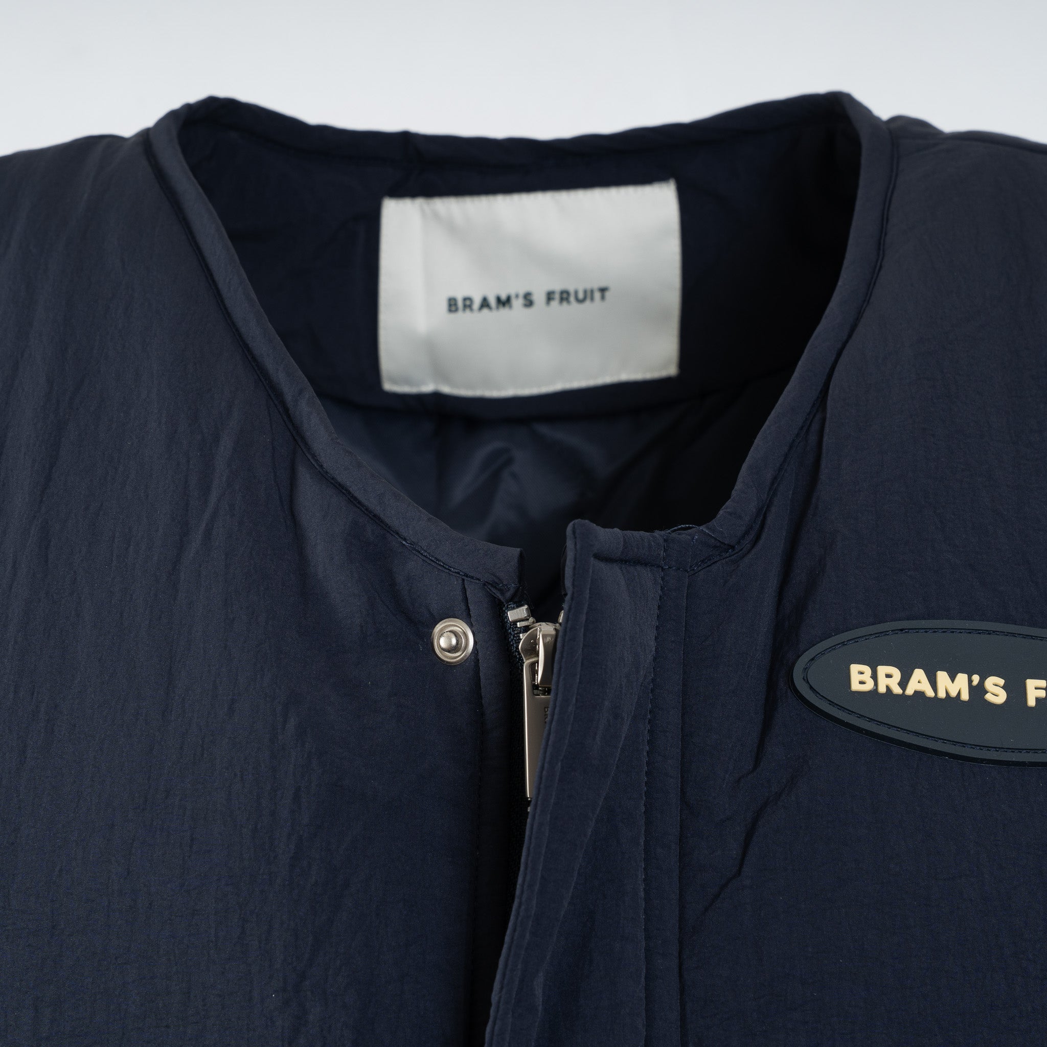 Bram's Fruit Bodywarmer Donkerblauw | Emblem Patch Padded