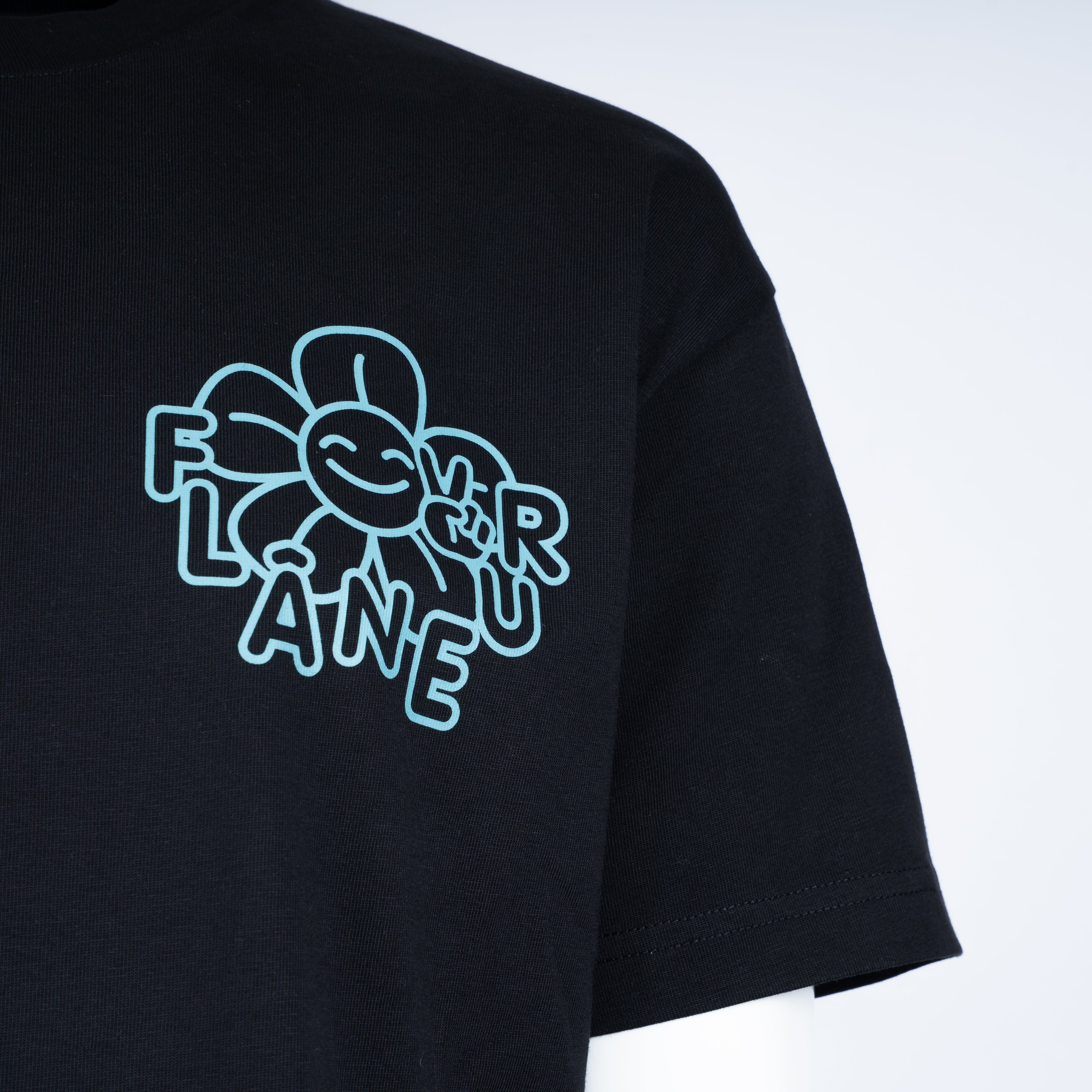 Flaneur T-Shirt Backprint Zwart | Happy Flower