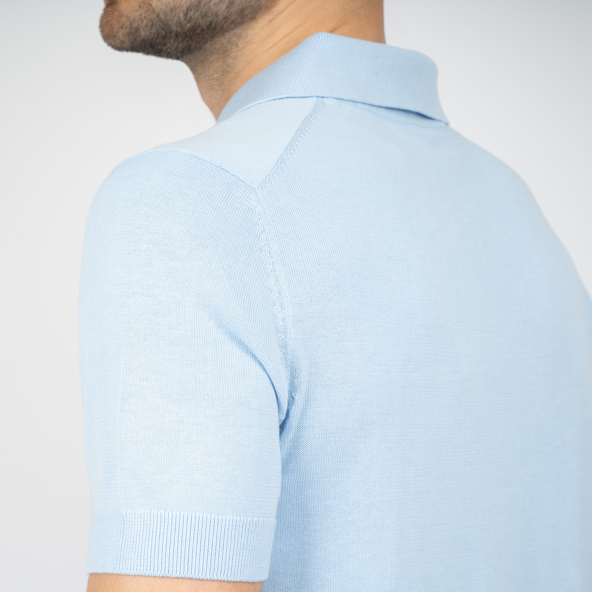 SEVEN DIALS Gebreide Buttonless Polo Lichtblauw | Dyche