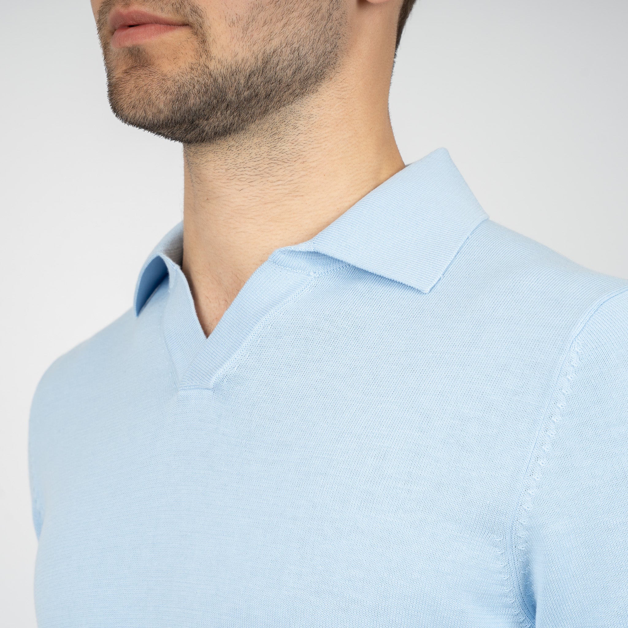 SEVEN DIALS Gebreide Buttonless Polo Lichtblauw | Dyche
