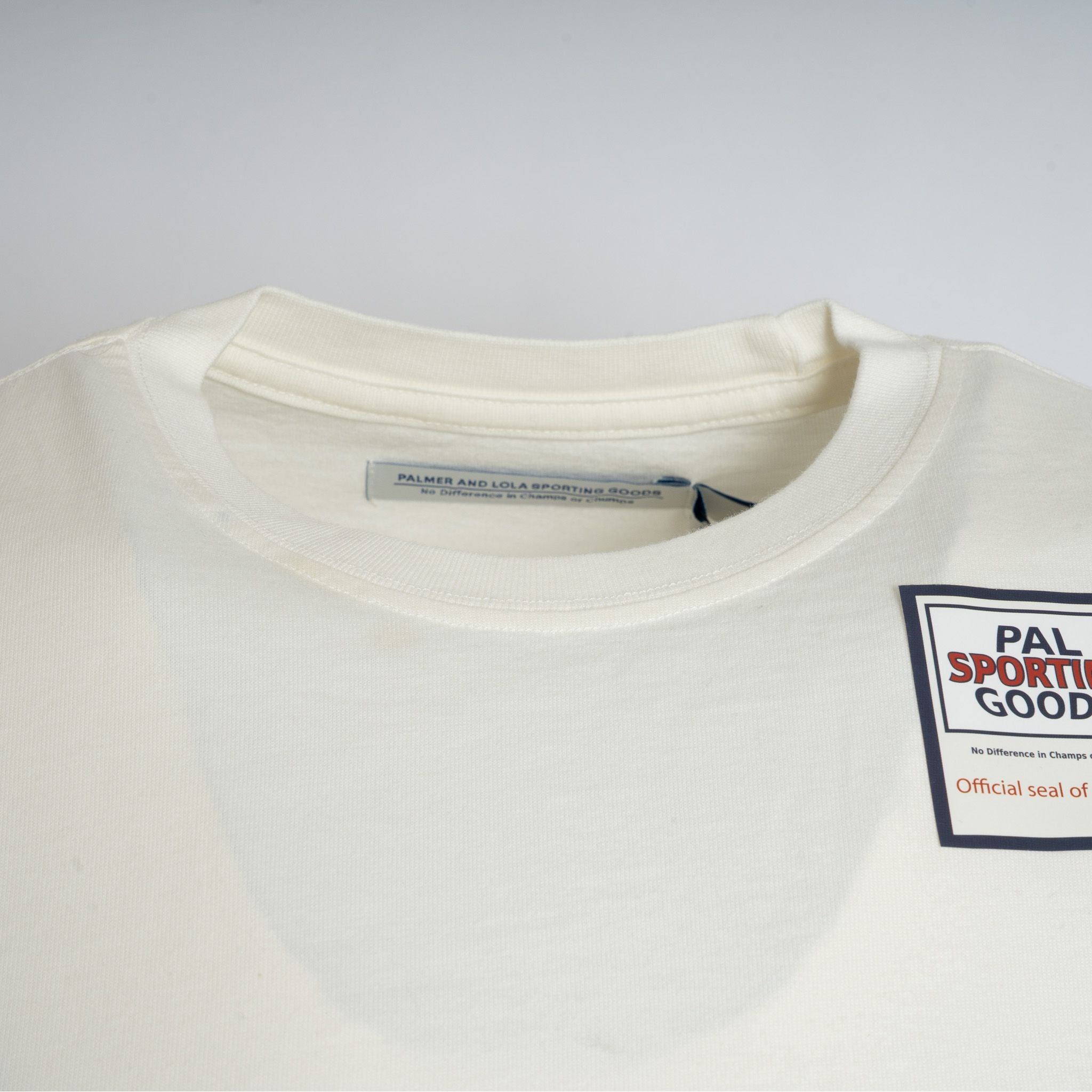 Pal Sporting Goods T-Shirt Backprint Crème | Worlds Tee